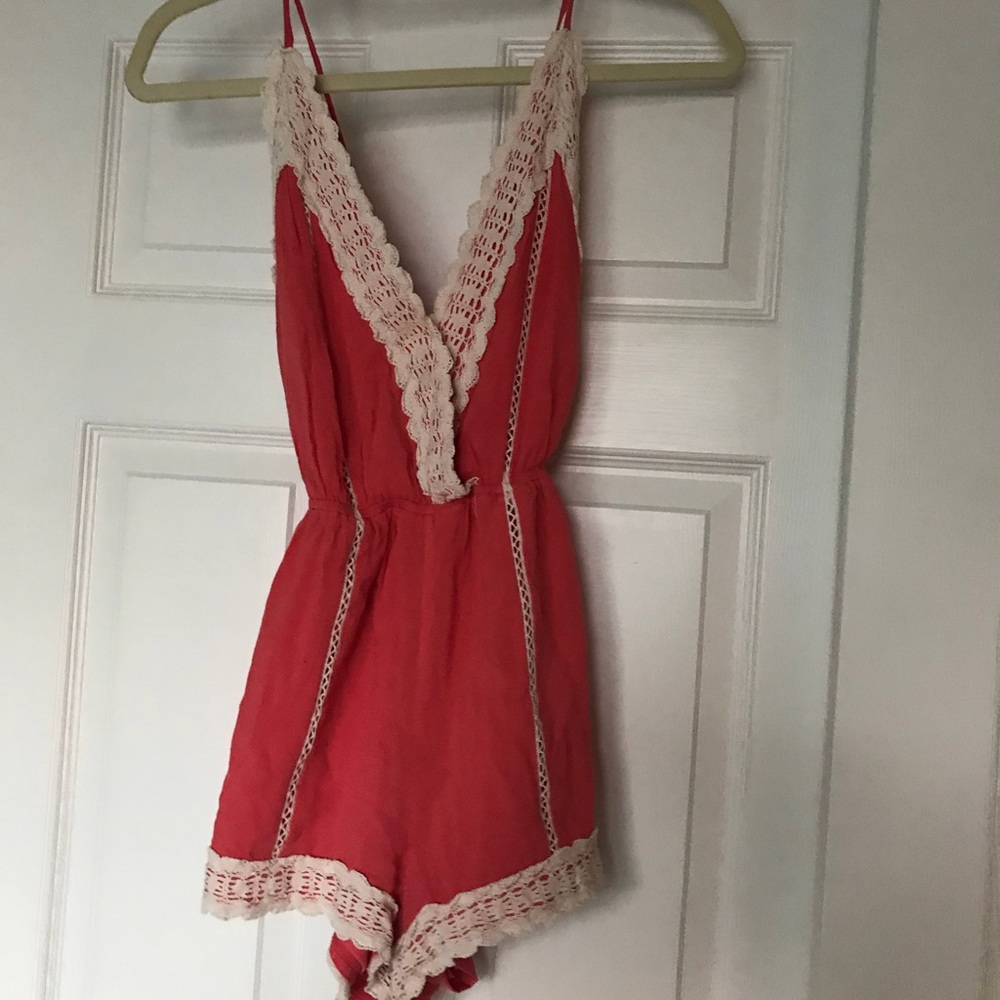 Open backed romper.